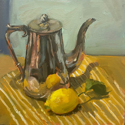 Coffee pot and lemon