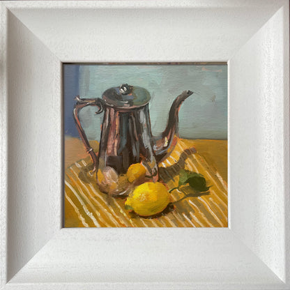 Coffee pot and lemon